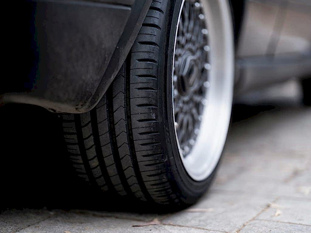 a close up of a tire on a car