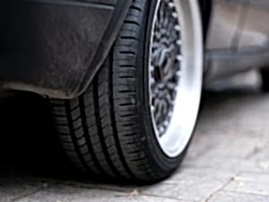 a close up of a tire on a car