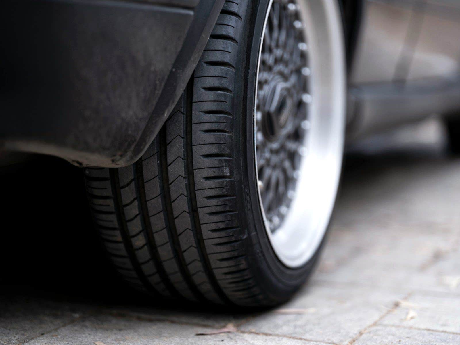 a close up of a tire on a car