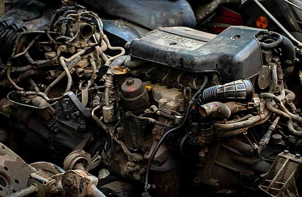 Close-up of a complex car engine with many wires.